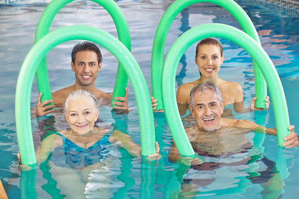 Group of senior people with swim noodles